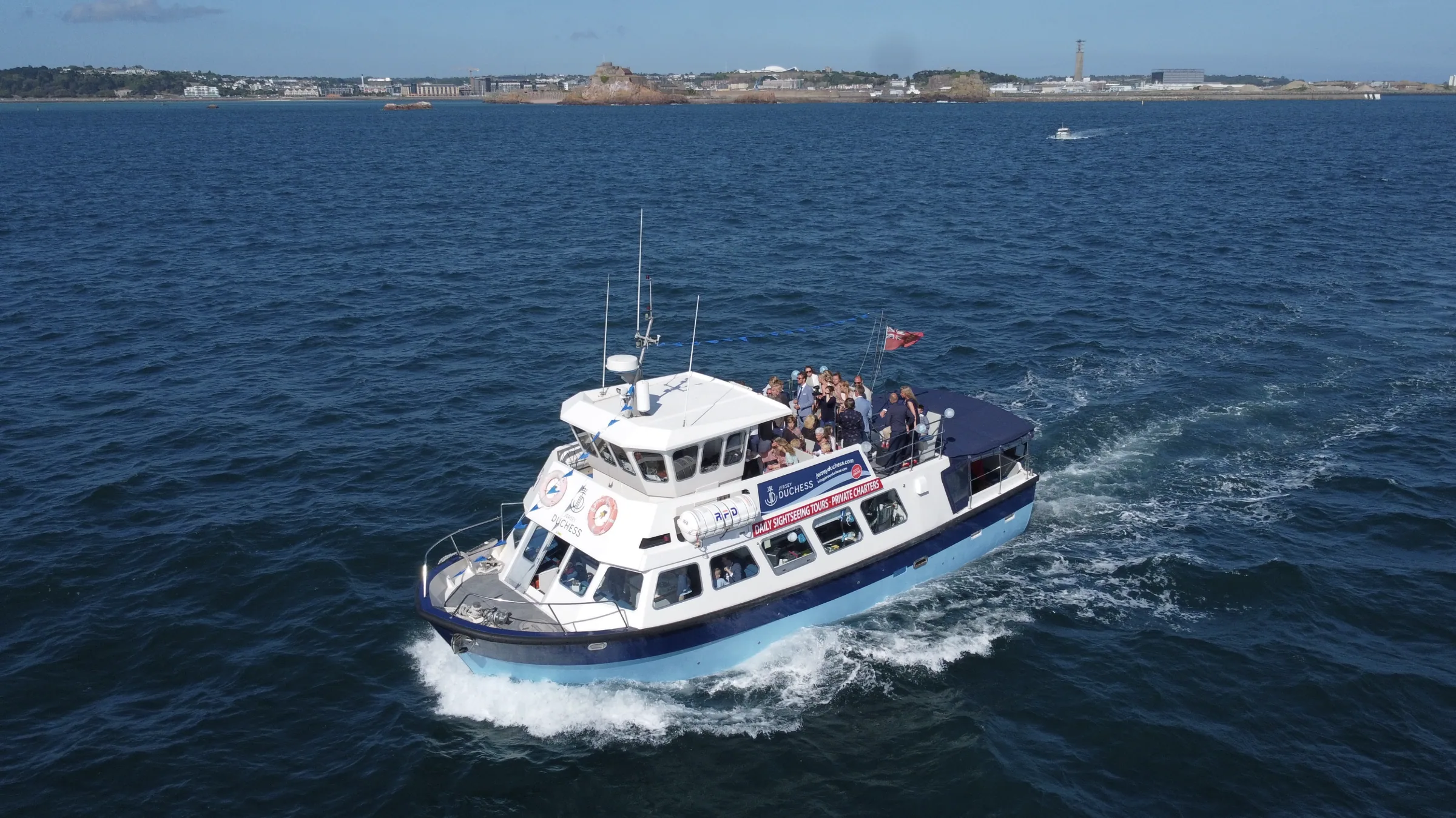 Sunset party boat cruise from St Helier — Jersey