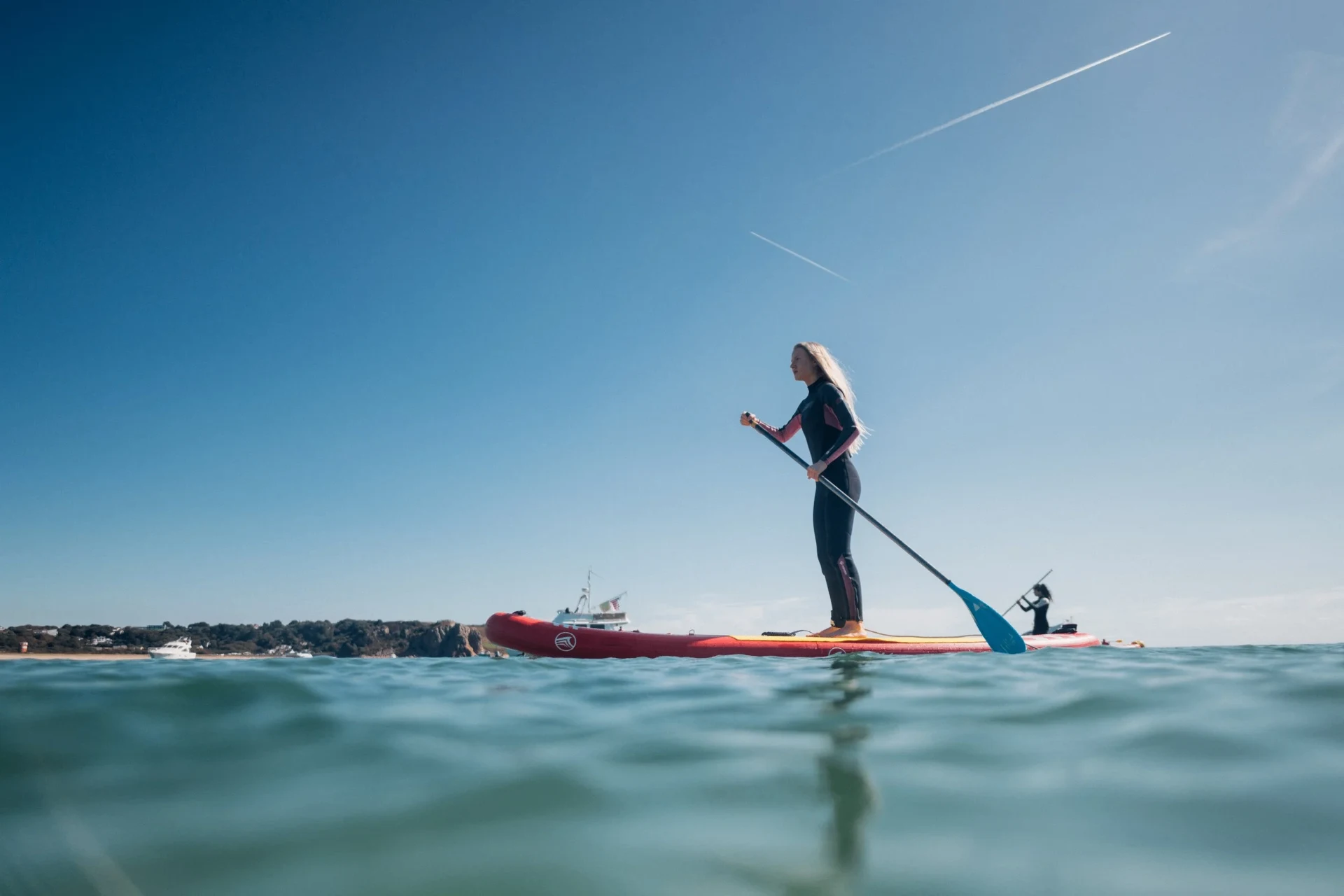 Stand-up paddleboard across St Aubin's Bay — Jersey